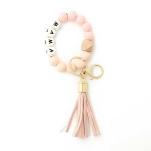 Detail of pink silicone beads, wood accent, and MAMA letter beads with golden clasp