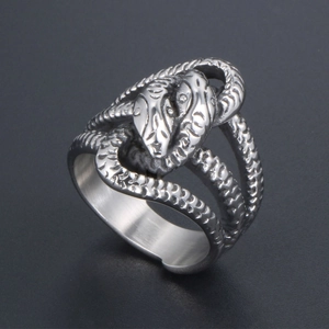Vintage punk silver stainless steel double-headed snake ring for men on gray surface