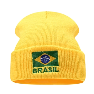 Bright yellow knit beanie featuring an embroidered Brazil flag and Brasil text logo