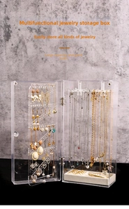 Detailed view of acrylic jewelry organizer with earring racks and velvet ring tray