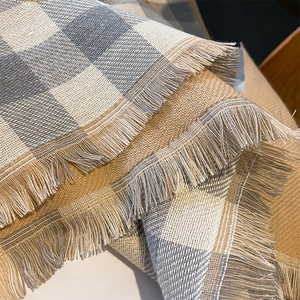 Thick warm cashmere-like plaid scarf with floral jacquard and fringe edges in beige and grey