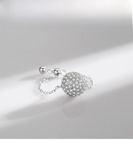 Detail of S925 sterling silver chain ring with pavé diamond ball and adjustable slide clasp