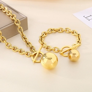Fashionable gold titanium steel jewelry set with OT toggle clasp and large ball pendant