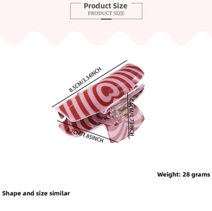 Detailed size specifications of heart-patterned hair claw clip with 28g weight