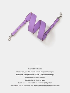 Detail of adjustable purple leather strap with silver metal swivel hooks and buckles