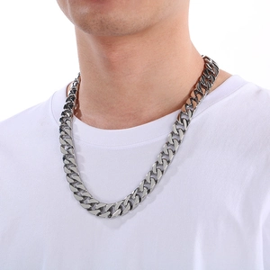 Men's hip hop 15mm silver flat Cuban link chain necklace worn by a male model