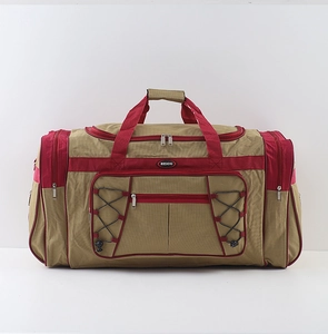 Detailed view of large khaki travel bag with burgundy straps and durable oxford fabric
