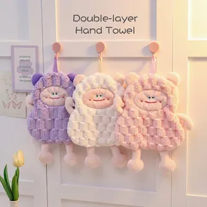 Three-pack of soft cartoon coral fleece hanging hand towels in purple, white, and pink