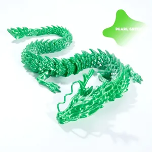Macro shot of 3D printed Pearl Green articulating dragon showing flexible joints and silk texture