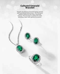 Detailed set featuring oval emerald jewelry with shimmering halo of white cubic zirconia