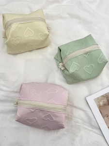 Mini trousses de maquillage à motif cœur gaufré en jaune vert et rose avec fermeture éclair