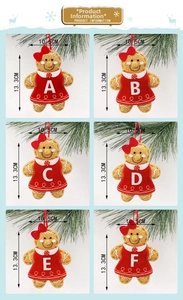 Detailed grid of Christmas gingerbread girl plush ornaments with A-F letter embroidery