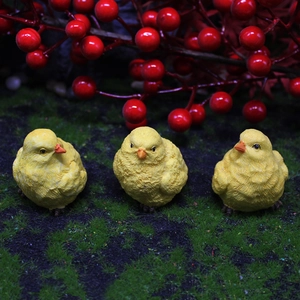 Three cute yellow resin chick figurines for garden landscape and home decoration