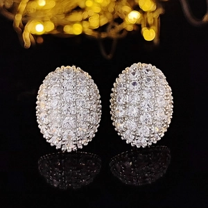 Elegant silver-tone oval stud earrings with pavé set sparkling zircon stones