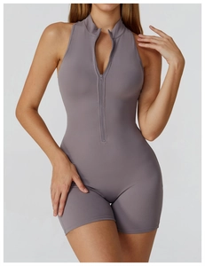 Detail of high-neck sleeveless sports jumpsuit with front half-zip and high-stretch fabric