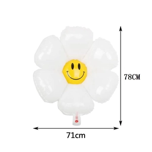 Large white daisy foil balloon with yellow smiley face center for birthday party decor