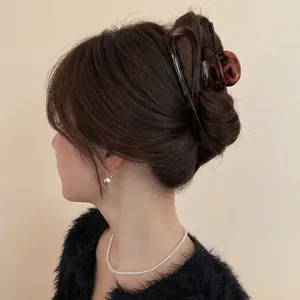 Leopard print amber resin cross hair claw clip for elegant French style updos