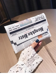 Creative newspaper print chain crossbody bag with retro letter patterns and gold strap