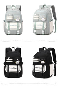 Detailed front and side views of high capacity student backpack with cute cat design