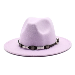 Detail of lavender fedora hat showing textured wool and western metallic star belt decoration