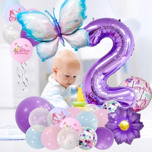 Purple butterfly balloon set for 2nd birthday party with number 2 and floral decorations
