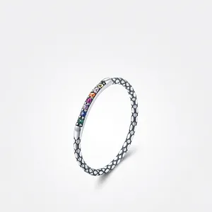 Retro s925 silver ring with textured surface and seven colorful rainbow gemstones