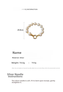 Detail of 20.8cm real gold plated pearl bracelet with zircon clasp and size specs
