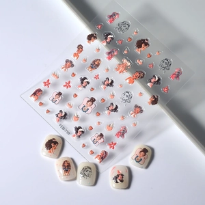 Detailed view of 5D embossed nail stickers with cartoon girl motifs and floral accents