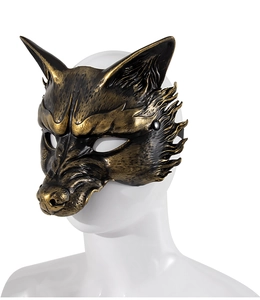 Detail of bronze wolf mask with metallic brushed texture and fox style design for party