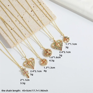Golden pendant necklace collection featuring teddy bear and heart designs with colorful zircons