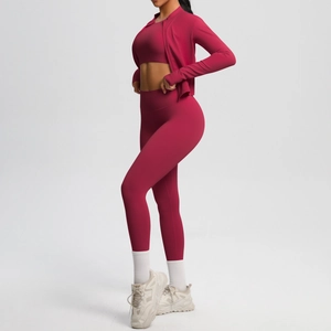 Three-piece yoga set featuring a zip jacket, sports bra, and high waist leggings in burgundy