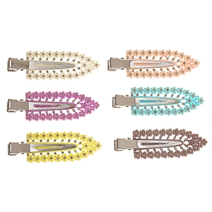 Set of 6 colorful floral hair clips with rhinestones and hollow leaf design on white background