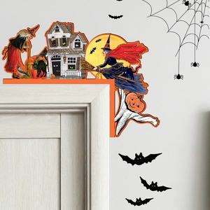 Detail of vintage Halloween door corner decor featuring a witch, ghost house and bat