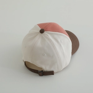 Top view of color-block kids baseball cap with adjustable back strap and metal buckle