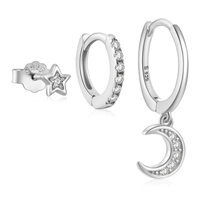 Detail of 925 sterling silver star and moon earring set with sparkling cubic zirconia