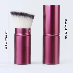 Dual states of retractable purple makeup brush showing open 9.5cm and closed 10.4cm dimensions
