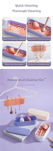 Detail view of pink silicone cleaning mat with textures for makeup brushes and sponges