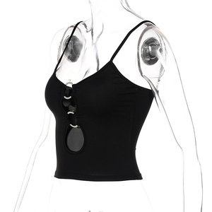 Detail of black crop tank top featuring three silver metal rings on the front cutout