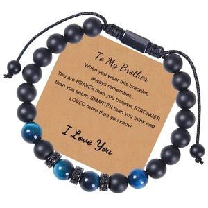 Detail of tiger eye beads bracelet on 'To My Brother' message card with braided cord