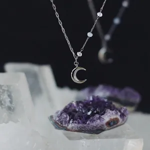 Elegant crescent moon pendant necklace with transparent crystal beads on stainless steel chain