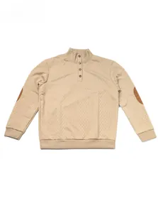 Detail view of khaki knit polo sweater featuring textured diamond weave and brown elbow patches