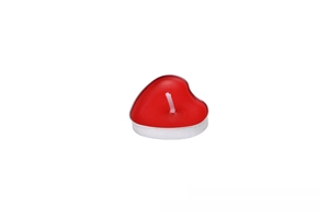Close-up of a red heart-shaped tea light candle in a silver aluminum case with cotton wick
