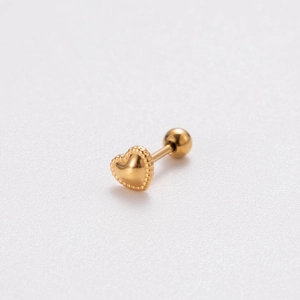 Detail of golden heart stud earring with beaded edge and screw-back ball closure