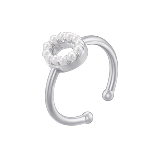 Detail of silver open ring featuring a circular design set with small white pearls