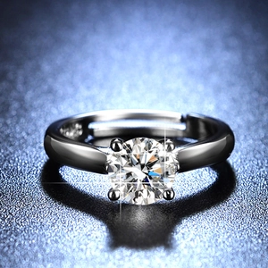 Macro shot of S925 sterling silver ring showing the classic four-prong diamond setting