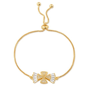Detail of adjustable gold-plated bracelet featuring a cross design with sparkling zircons