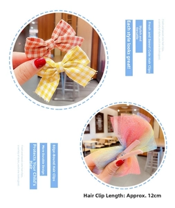 Detail view of 12cm bow hair clips with red plaid and sparkling tulle mesh design