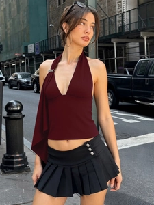 Deep burgundy halter V-neck knit top and black pleated mini skirt stylish outfit