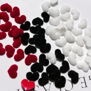 Plush heart nail art charms in red, black, and white for winter DIY decorations