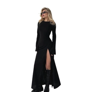 Detail view showing a slim fit black long sleeve dress with a side slit and elegant round neck